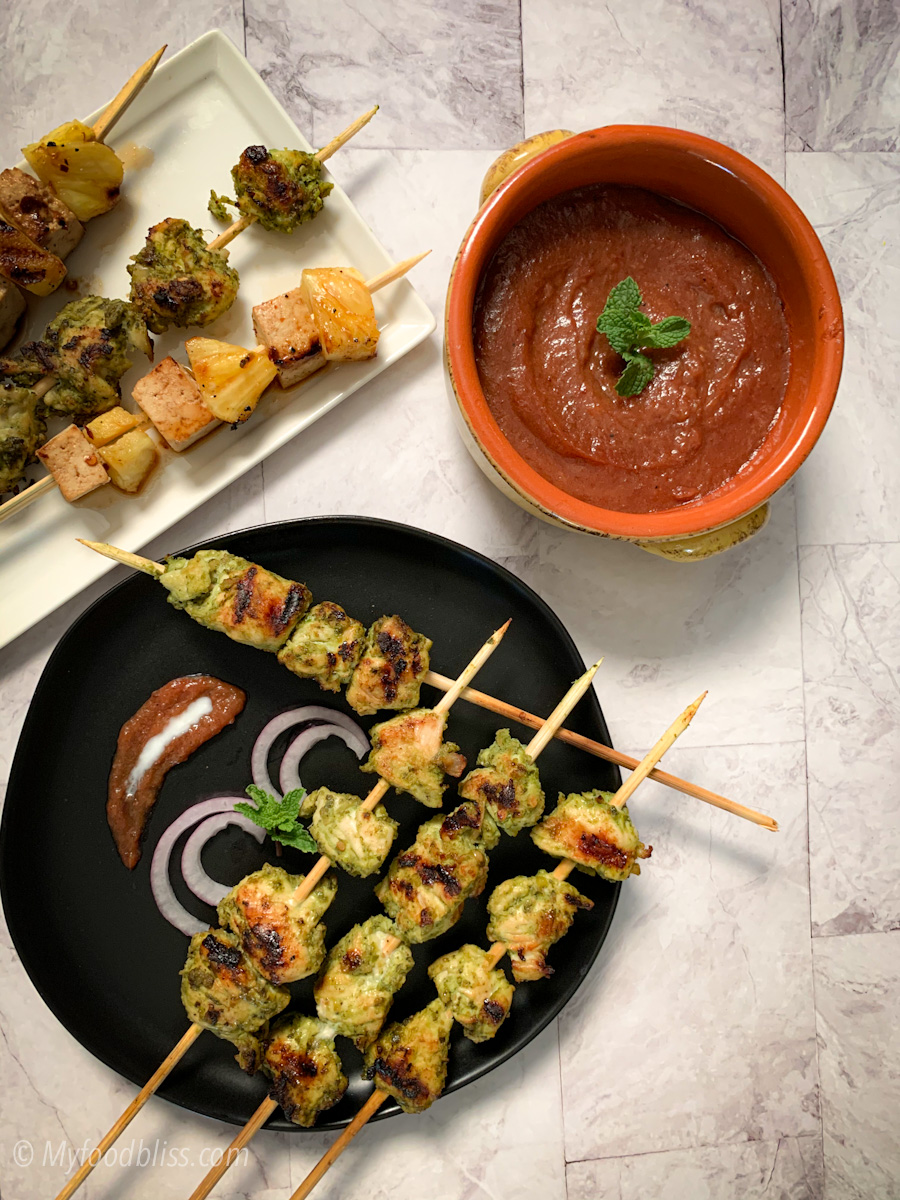 Sizzling green chicken kebabs with plum & date sauce- gluten free